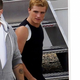 Illustration for article titled First set pics from emCatching Fire/em show new the Hunger Games training outfits... and Finnick!